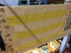 A yellow, white and pink panelled Durham quilt, with floral border and a floral reverse, 215 x 170cm