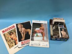 Four Mayfair calendars and a large quantity of nude postcards