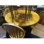 Modern circular table and four Windsor style chairs