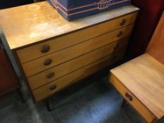 A Butilux teak chest of drawers, headboard and dressing table