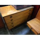 A Butilux teak chest of drawers, headboard and dressing table