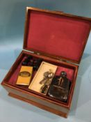 A walnut box containing; hip flask, a Mauchline ware prayer book, 'Kelso Abbey' and 'Floors Castle',