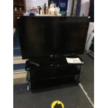 LG TV with remote and stand, 46"