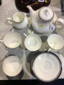 A Royal Doulton 21 piece 'Sarabande' pattern tea service