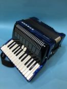 A Hohner Amica 1148, with hard carry case