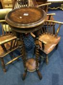 An oak barley twist two tier circular pedestal