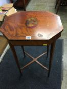 A small late 19th / early 20th century satinwood side table, with crossbanding and painted
