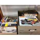 Two boxes of Matchbox model kits