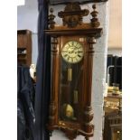 A walnut cased double weight Vienna wall clock