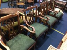 A set of four mahogany carver chairs