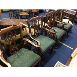 A set of four mahogany carver chairs