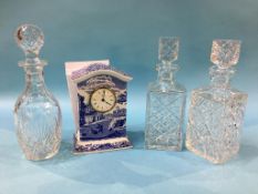 A Spode 'Italian' clock and three glass decanters