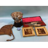 A cased carving set, a silver and blue enamelled compact, a silver plated cup, a leather