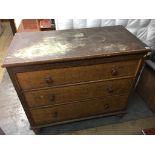 A scrumbled pine blanket chest, with three false drawers to the front