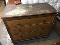 A scrumbled pine blanket chest, with three false drawers to the front