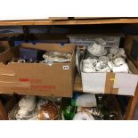 Four boxes of china, glassware, LPs etc.