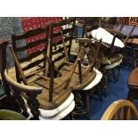 A set of six Ercol single dining chairs