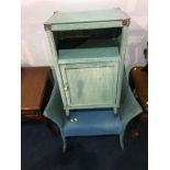 Blue Lloyd Loom chair and a basket weave bedside cabinet