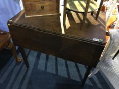 A 19th century mahogany drop leaf table, with single drawer