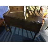 A 19th century mahogany drop leaf table, with single drawer