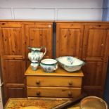 Two pine wardrobes and a chest of drawers