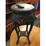 A Chinese hardwood and marble inset pedestal table