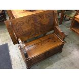 An oak monks bench