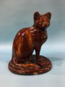 A 19th century salt glazed model of a 'Canney Hill' Cat, 29cm height