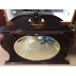 A mahogany oval mantel mirror 132 X 100CM APPROX