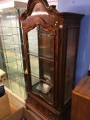 A Continental walnut display cabinet, with single drawer