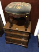 A 19th century mahogany stool and a reproduction mahogany stepped bedside chest of drawers