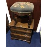 A 19th century mahogany stool and a reproduction mahogany stepped bedside chest of drawers