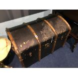 A domed top travel trunk