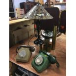 Tiffany style lamp, two GPO telephones and brass shell cases