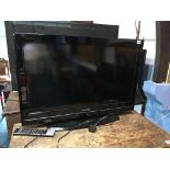 Toshiba 31" flatscreen TV, with remote