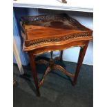Reproduction mahogany occasional table, with pierced gallery