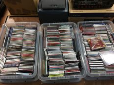 Three boxes of CDs