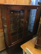 Oak 'Old Charm' glazed display cabinet, 161cm high x 108cm wide x 39cm deep approx.