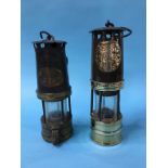 A Hailwood & Ackroyd Miners lamp and a W. E. Teal Miners lamp.