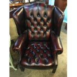Oxblood leather Chesterfield wing back armchair, Seat height 40cm x 47cm wide x 55cm deep, 107cm