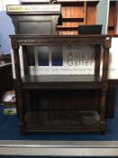 An oak three tier buffet