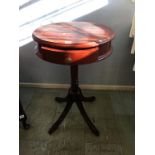 Circular mahogany occasional table, with inlaid top