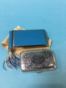 A Deco style cigarette case / powder compact and a silver cigarette case