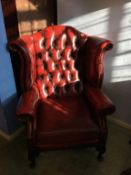 Oxblood leather Chesterfield wing back armchair