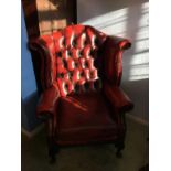 Oxblood leather Chesterfield wing back armchair