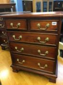 Small reproduction mahogany chest of five drawers, 56cm x 32cm x 68cm