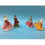 Four Royal Doulton figures 'Christmas Day 2006', 'Stephanie' (signed), 'Festive Wishes', and '