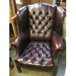 Oxblood leather Chesterfield wing back armchair