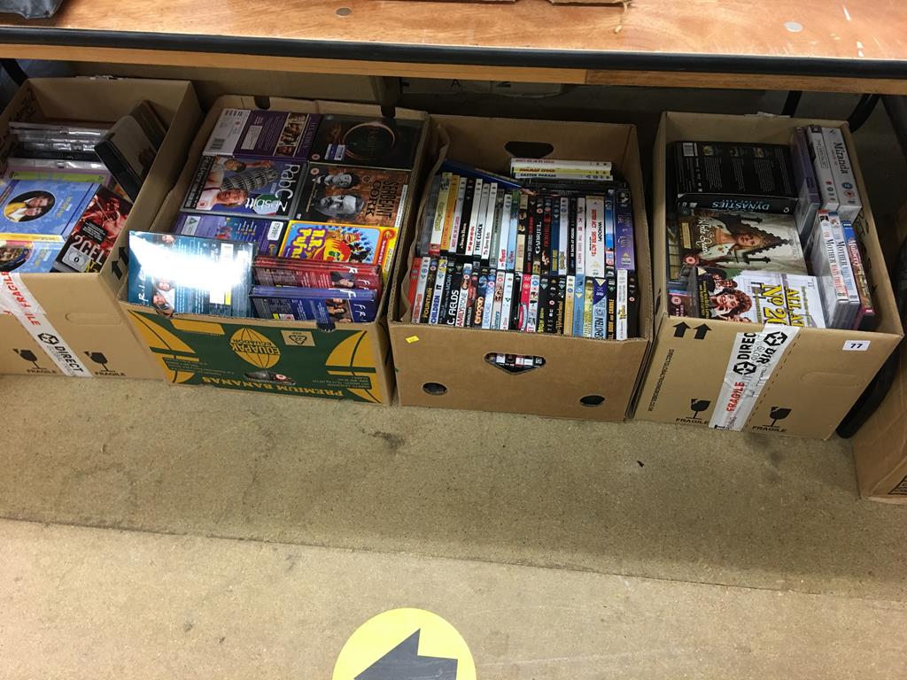 Four boxes of DVDs