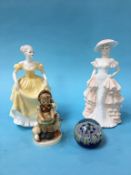 Two Coalport figures, a paperweight and a Hummel figure